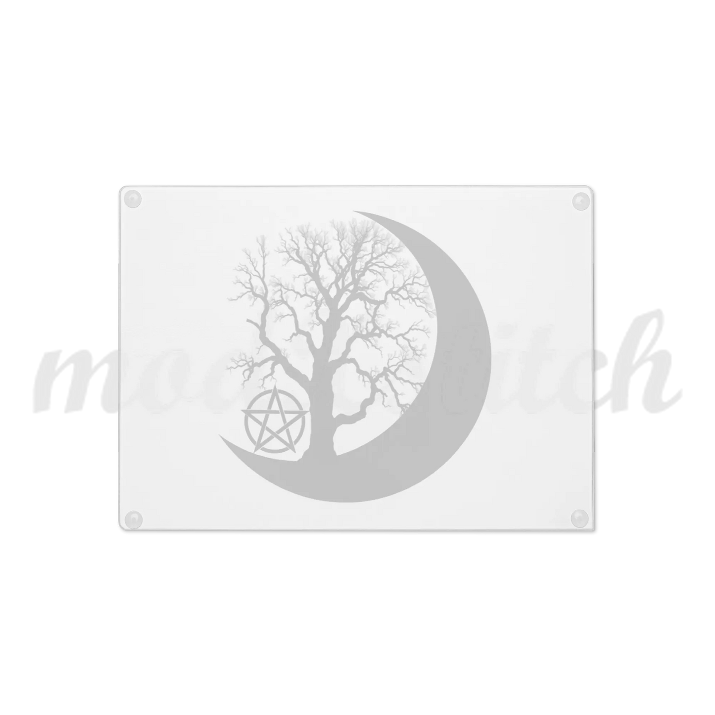Beautiful glass cutting board with a tree silhouette inside a crescent moon on a white background.  Perfect for witches and wiccans